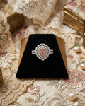 14ct White/Rose Fancy Pink Diamond and Diamond Cluster Halo Ring