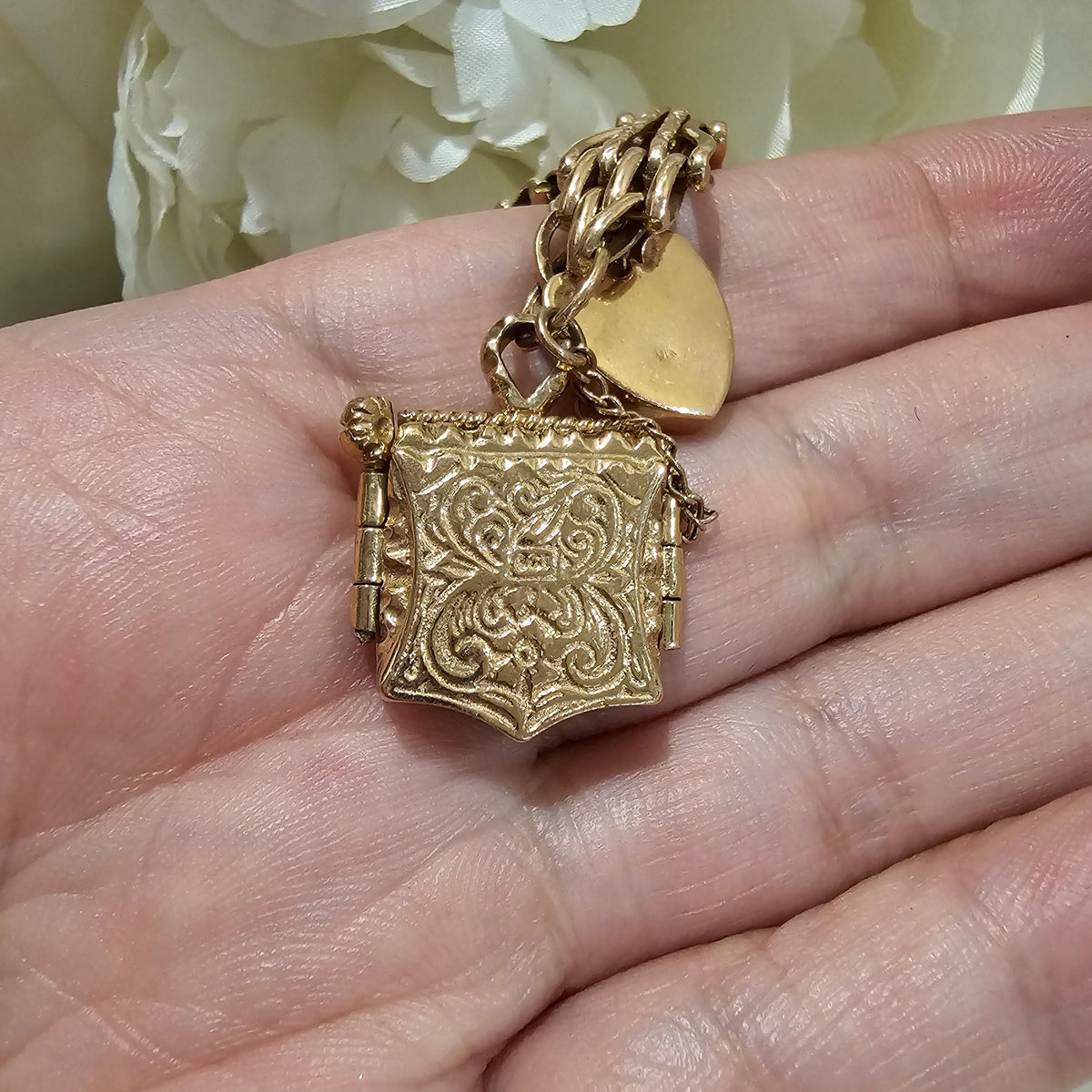 9ct Rose Gold 4 Bar Gate Bracelet with Garnet Locket